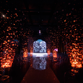 Glance path lies between garlands made of threads with chrysanthemum buds
